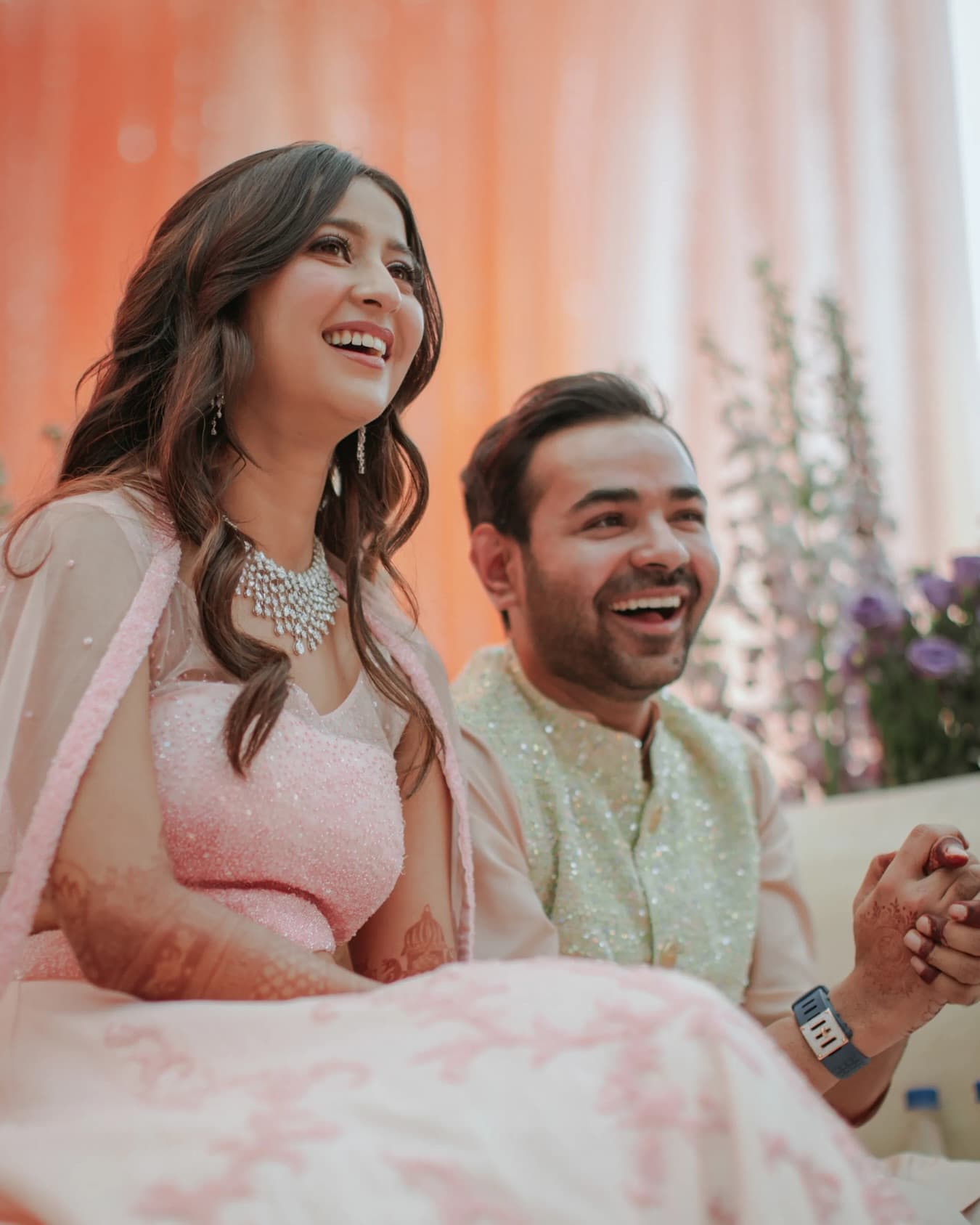 Smiling couple at their wedding celebration